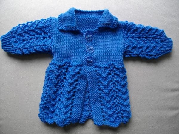 Hand knitted baby matinee jacket