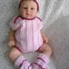 hand knitted bodysuit outfit for a 22 inch reborn girl doll