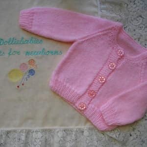 Hand knitted round neck baby cardigan