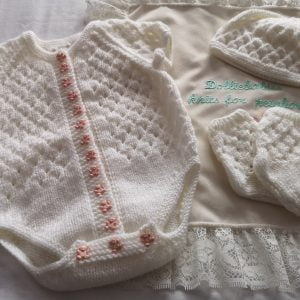 Hand knitted girl's 3-6 month bodysuit