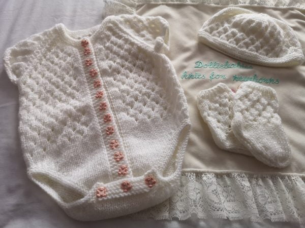 Hand knitted girl's 3-6 month bodysuit