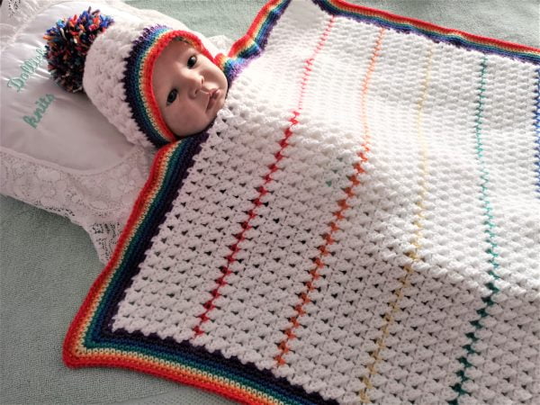 handmade crocheted rainbow receiving blanket